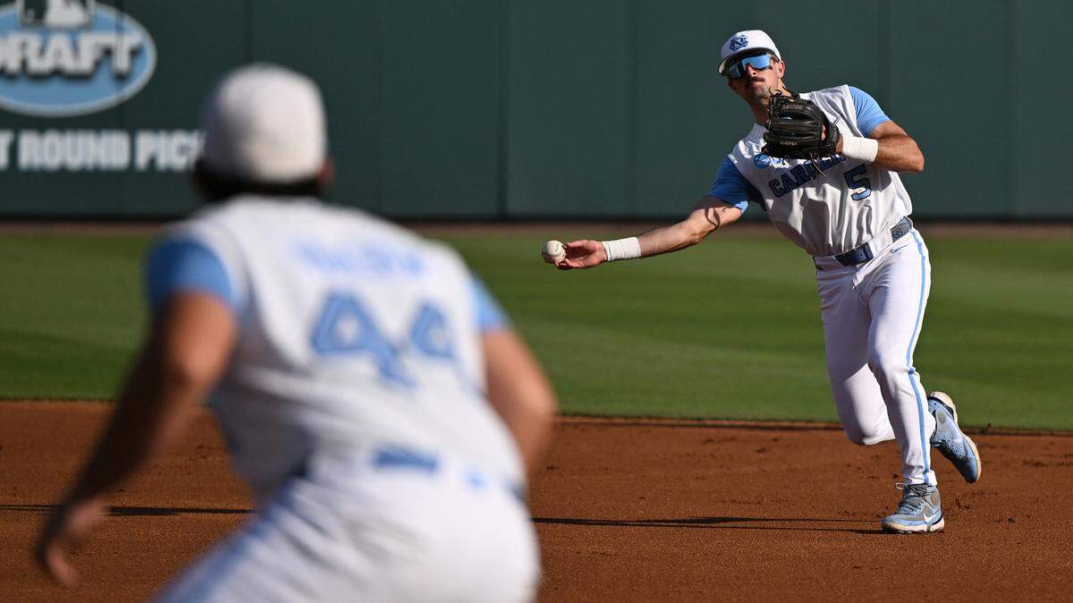 North Carolina Tar Heels infielder Gavin Gallaher (5) throws to first for an out during game 2 of the Chapel Hill Regional at Boshamer Stadium. 
