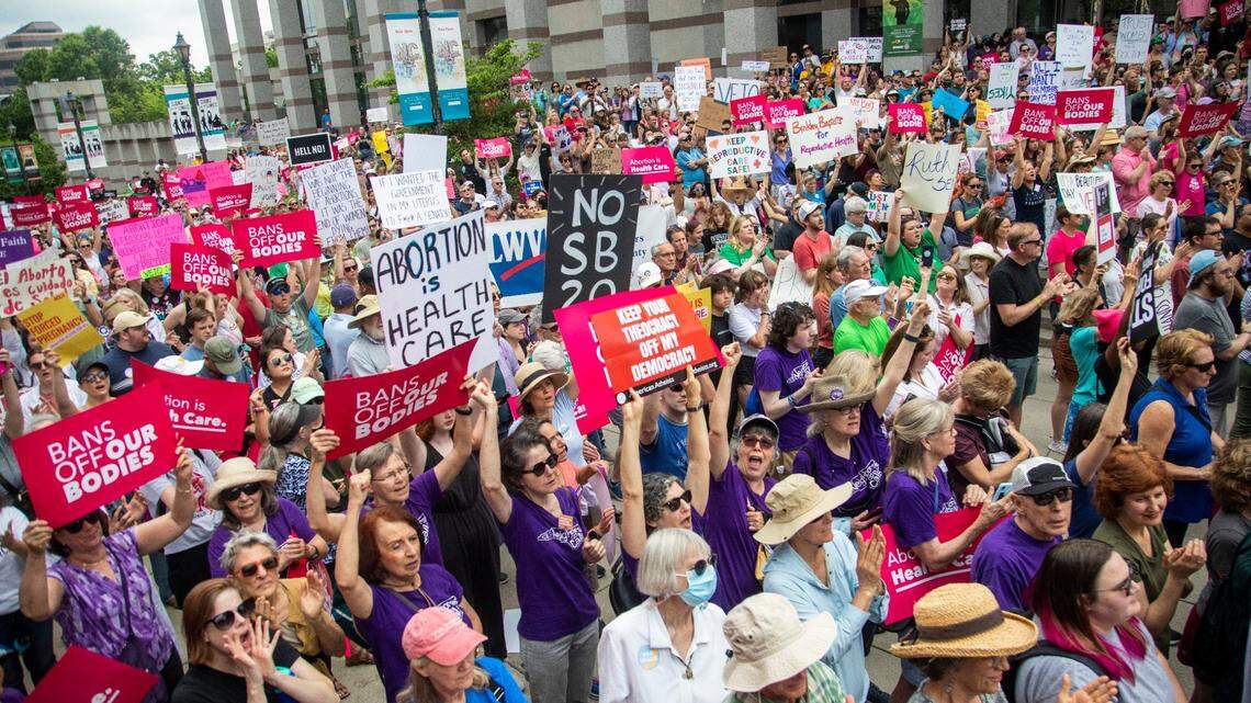 Hundreds of abortion ban veto supporters turned out to watch Gov. Roy Cooper sign a veto of the on Bicentennial Mall in Raleigh Saturday, May 13, 2023.