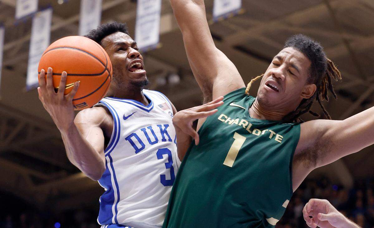 Duke’s Jeremy Roach (3) drives to the basket as Charlotte’s Dishon Jackson (1) defends during the first half of Duke’s game against Charlotte at Cameron Indoor Stadium in Durham, N.C., Saturday, Dec. 9, 2023.