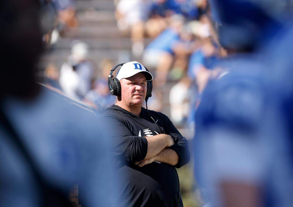 Duke head coach Mike Elko watches from the sidelines during the first half of the Blue Devils’ 38-14 win over Northwestern on Saturday, Sept. 16, 2023, at Wallace Wade Stadium in Durham, N.C.