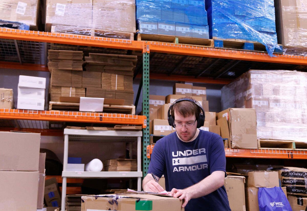 Landon Warren works at Gabi’s PALS (Packaging, Assembling, Labeling and Shipping) on Friday, June 20, 2025, in Raleigh, N.C.