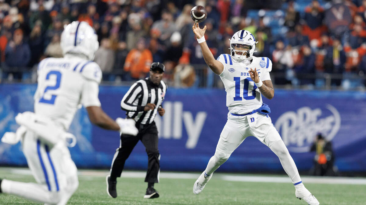 Duke quarterback Darian Mensah looks to throw during the first half of the Blue Devils’ 27-20 overtime win over Virginia in the ACC Football Championship on Saturday, Dec. 6, 2025, at Bank of America Stadium in Charlotte, N.C.