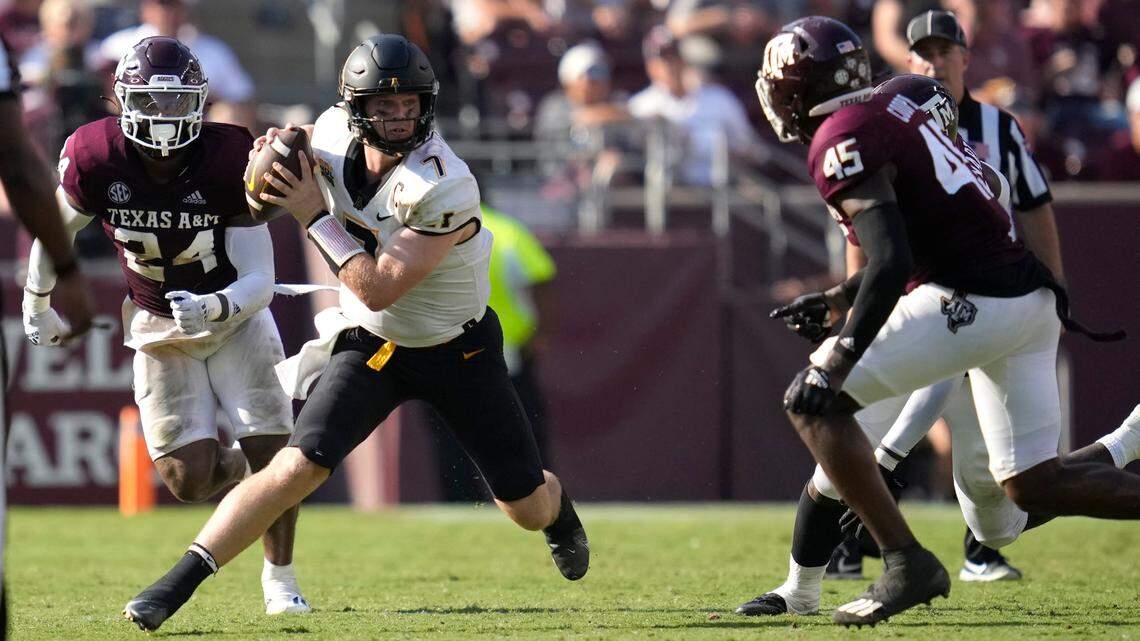 Appalachian State quarterback Chase Brice (7) runs out of the pocket against Texas A&M linebacker Edgerrin Cooper (45) during the second half of an NCAA college football game Saturday, Sept. 10, 2022, in College Station, Texas.