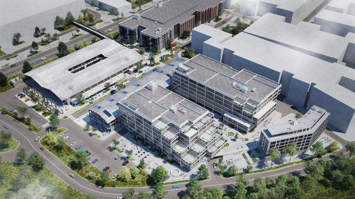 A conceptual rendering of the Raleigh Iron Works development, with office and residential space shown along with open walkable space.