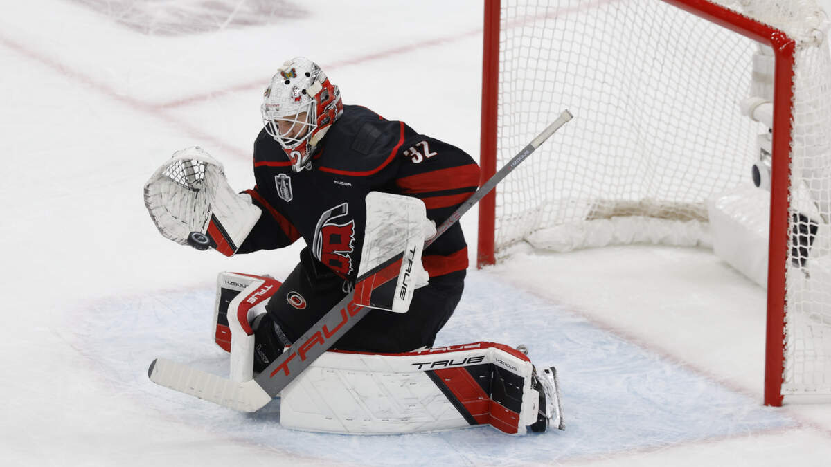 Hurricanes goalie Brandon Bussi stops a puck against Vegas in the first period of game five.
