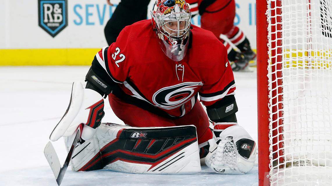 Carolina Hurricanes goaltender Antti Raanta (32) watches the puck against the Montreal Canadiens during the third period of an NHL hockey game in Raleigh, N.C., Thursday, Dec. 30, 2021. (AP Photo/Karl B DeBlaker)