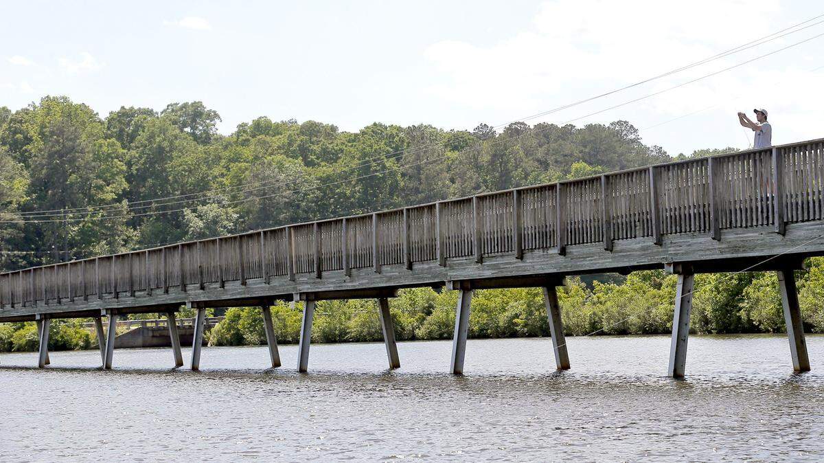 City officials tried to prevent flooding by releasing water from Lake Johnson before heavy rainfalls in January. The reservoir was full after a wet December.