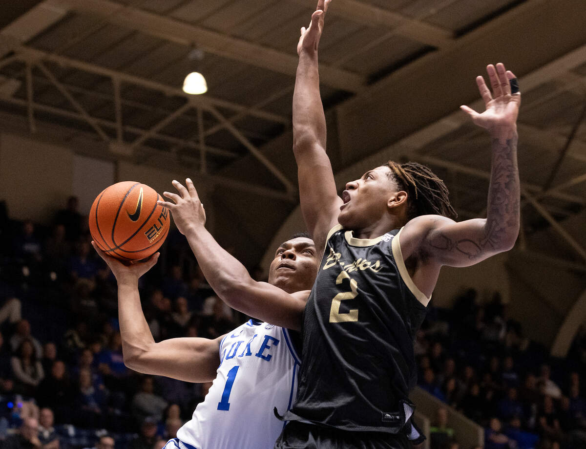 Duke’s Caleb Foster drives against UNC Pembroke’s Dallas Gardner during the second half of the Blue Devils’ 109-64 exhibition win on Wednesday, Nov. 1, 2023, at Cameron Indoor Stadium in Durham, N.C.