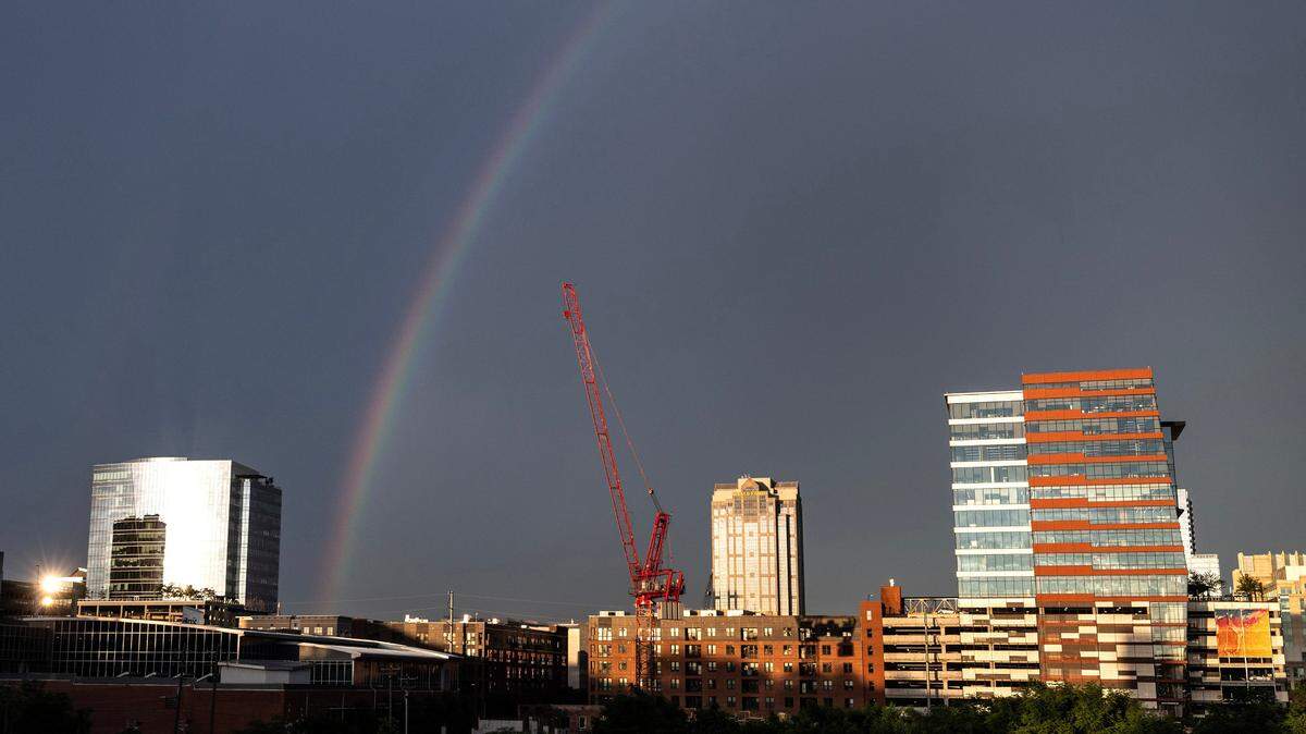 A rainbow appears over downtown Raleigh earlier this month.