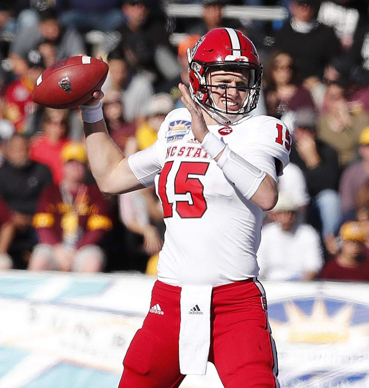 N.C. State quarterback Ryan Finley (15) passes during the first half of N.C. State's game against Arizona State in the Hyundai Sun Bowl at Sun Bowl Stadium in El Paso, Texas, on Dec. 29, 2017.