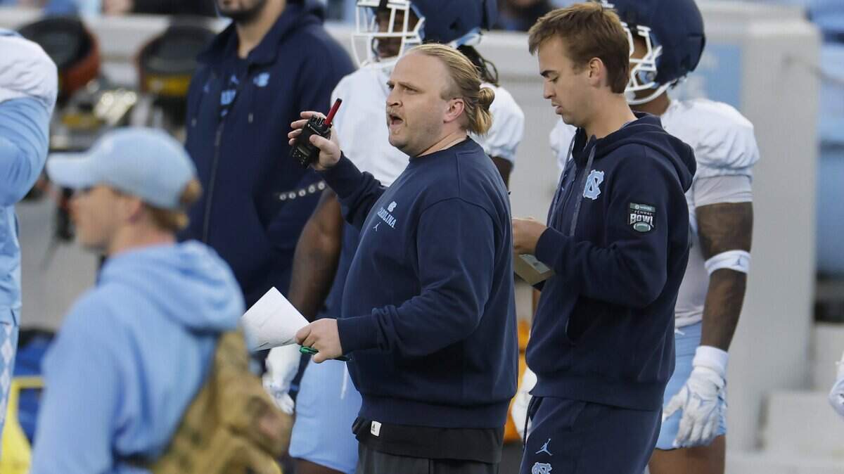 North Carolina defensive coordinator Steve Belichick, center, watches during UNC football’s Practice Like a Pro open practice at Kenan Stadium in Chapel Hill, N.C., Saturday, April 12, 2025.