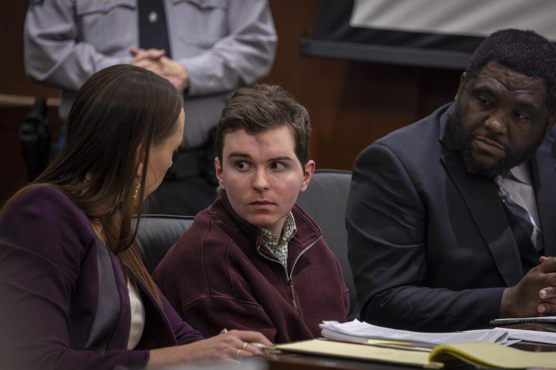 Austin Thompson, 18, pleads guilty during a hearing related to the 2022 Hedingham mass shooting at the Wake County Justice Center in Raleigh on Wednesday, Jan. 21, 2026. Thompson is charged with killing five people and injuring two others in the Hedingham neighborhood, the deadliest mass shooting in the city’s history.