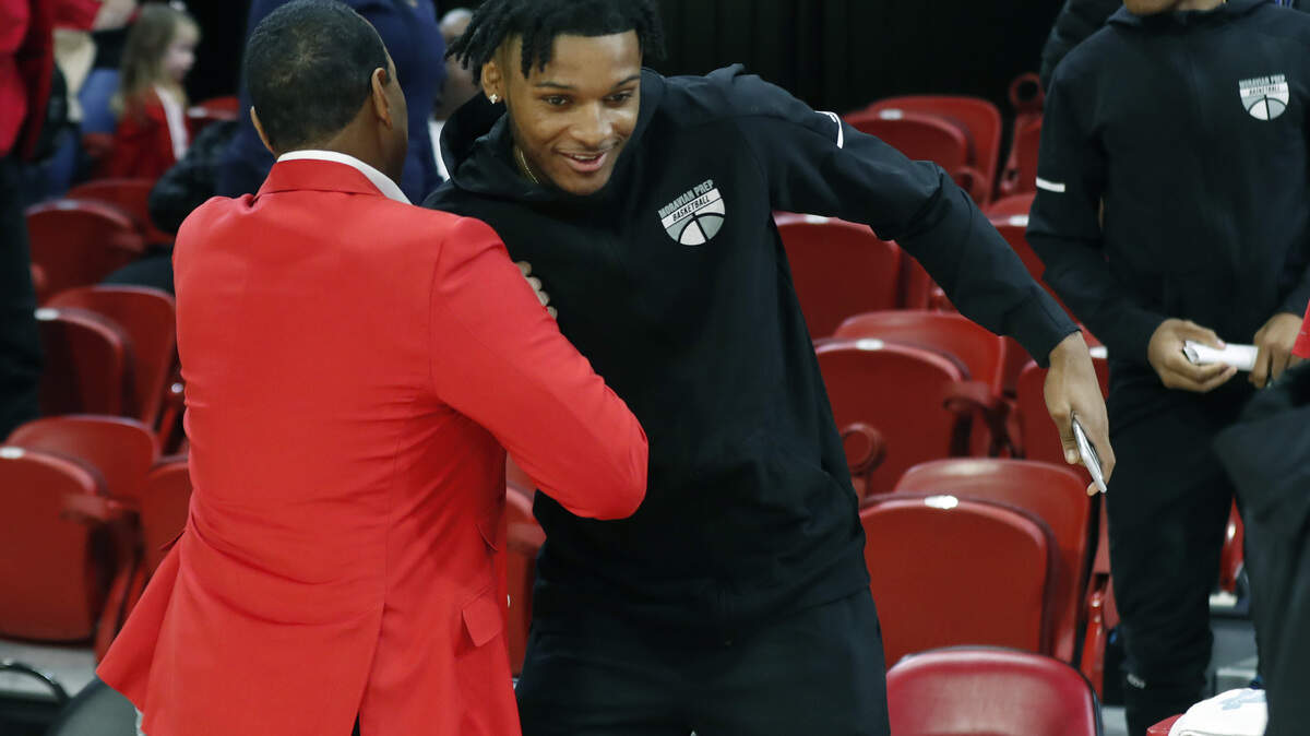N.C. State coach Kevin Keatts greets Josh Hall after the Wolfpack’s 95-64 victory over St. Francis Brooklyn at Reynolds Coliseum in Raleigh, N.C., Saturday, Nov. 16, 2019.