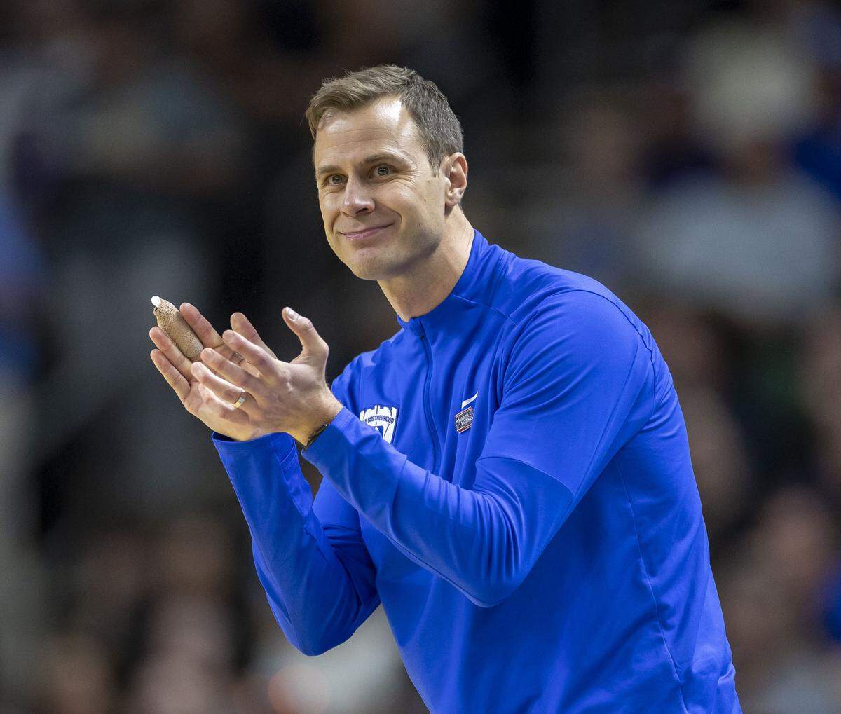 Duke coach Jon Scheyer flashes a smile as the Blue Devils secure their victory over TCU on Saturday, March 21, 2026, during the second round of the NCAA Tournament at Bon Secours Arena in Greenville, S.C.  Brown
