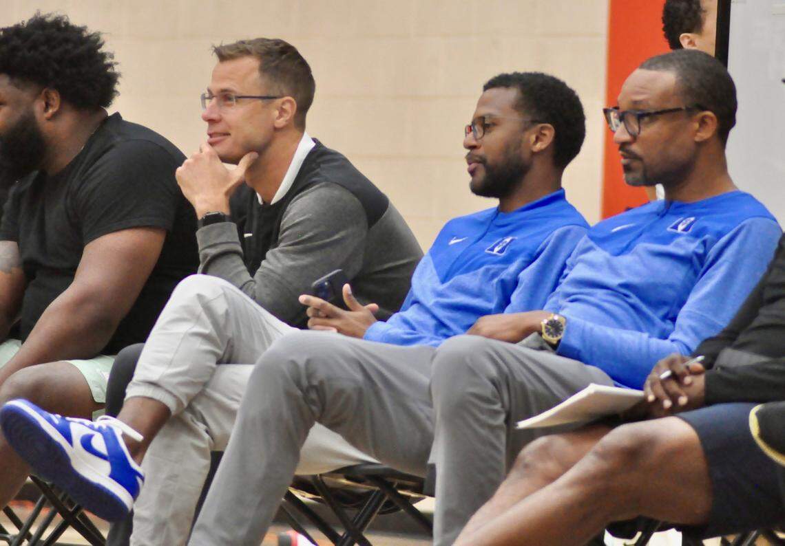 Duke men’s basketball head coach Jon Scheyer (left), assistant coach Jai Lucas (middle) and assistant coach Chris Carrawell (right) watch potential recruits play during the Nike Elite Youth Basketball League (EYBL) Peach Jam event in North Augusta, S.C. on Friday, July 22.