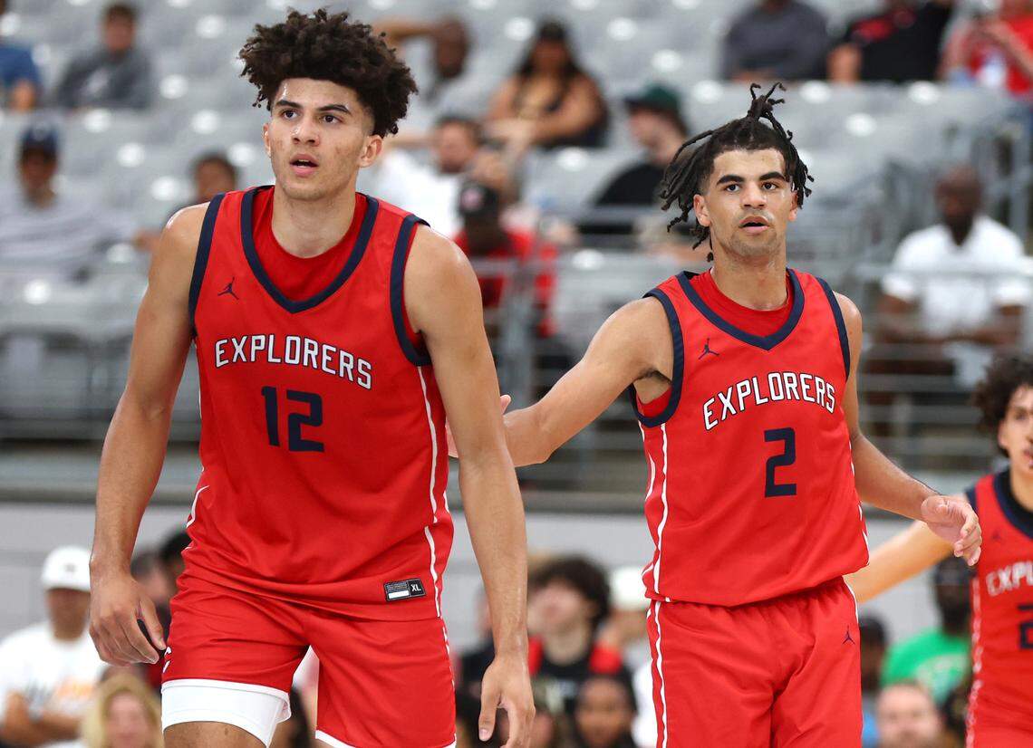 Columbus player Cameron Boozer (12) and brother Cayden Boozer (2)  play during the Section 7 high school boys tournament at State Farm Stadium in 2023.