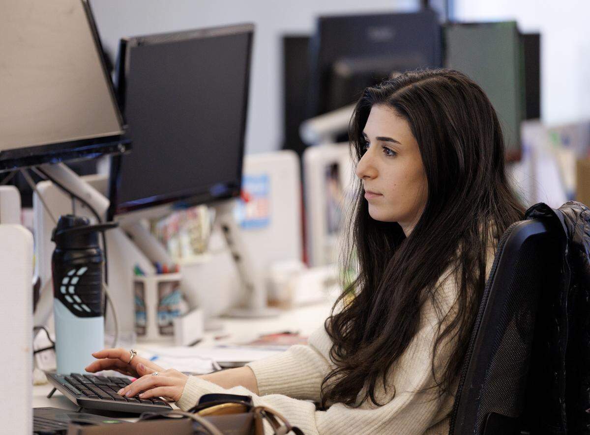 Esther Frances, legislative and lobbying reporter for The News & Observer, works at her desk on Wednesday, March 25, 2026. 