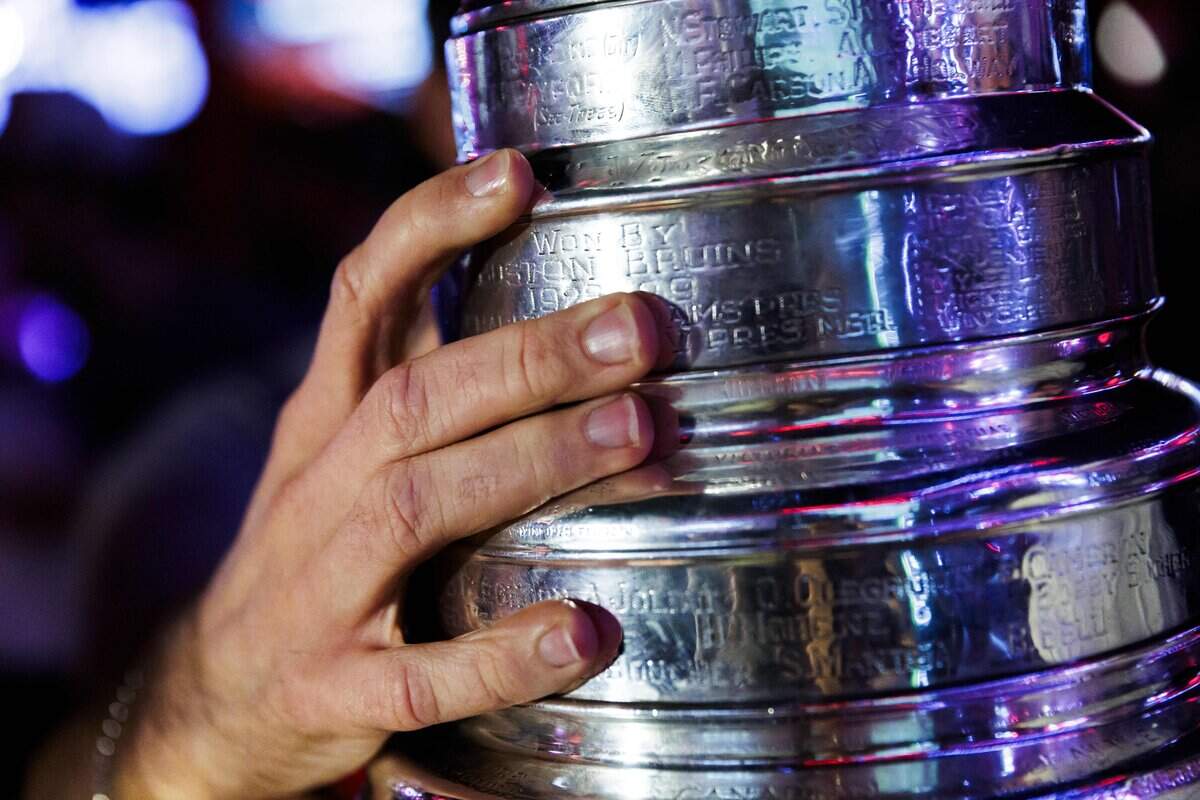 The Stanley Cup makes an appearance at Teets bar in Raleigh's Glenwood South district on Monday, June 15, 2026, as Carolina Hurricanes fans celebrated with the team’s players and staff following the Hurricanes’ Stanley Cup final 4-2 victory over the Vegas Golden Knights the evening prior.