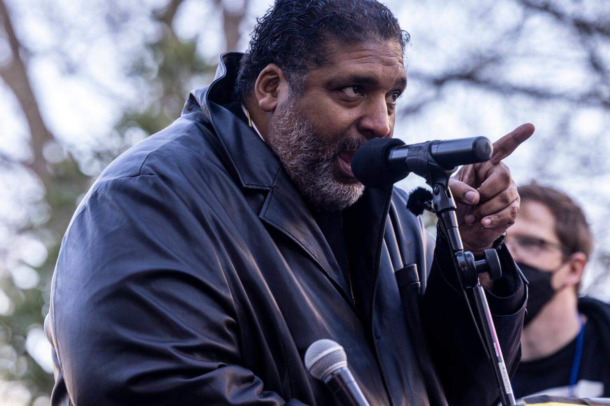 Rev. William Barber II speaks during a rally organized by the North Carolina Poor People’s Campaign Monday, March 28, 2022 at the Bicentennial Plaza in Raleigh. The rally was one of a series of assemblies that will culminate in a “Mass Poor People’s and Low-Wage Workers’ Assembly and Moral March on Washington and to the Polls” in Washington D.C. on June 18.