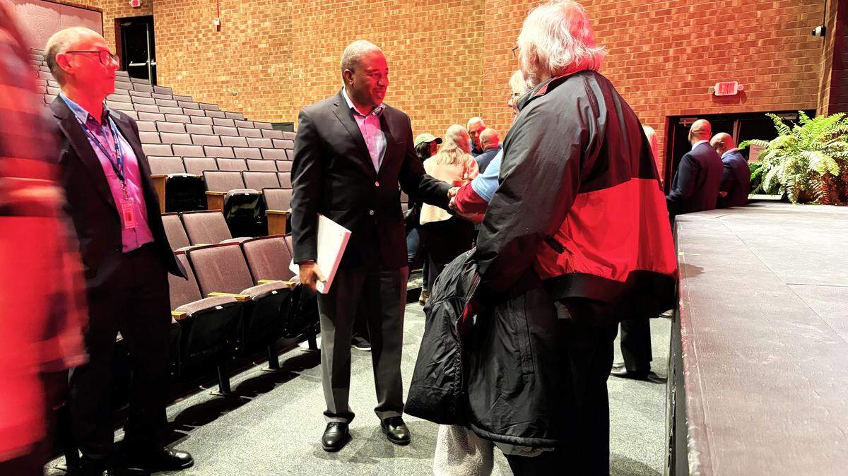 State Superintendent Mo Green stayed long after the event ended Wednesday, Oct. 29, 2025, at Chapel Hill High School to talk with educators and families about North Carolina’s five-year strategic plan for building better public schools.