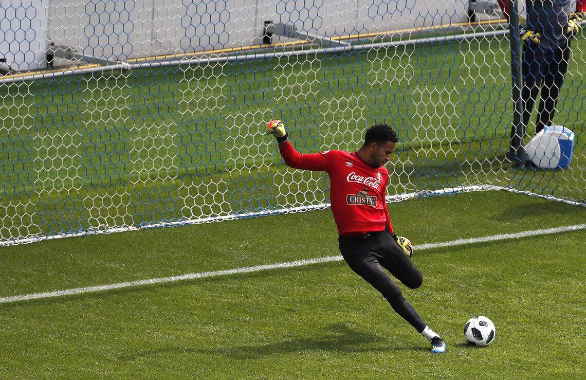 Peru goalkeeper Pedro Gallese kicks the ball during a training session at the 2018 soccer World Cup in Moscow, Russia, on Tuesday, June 12, 2018.