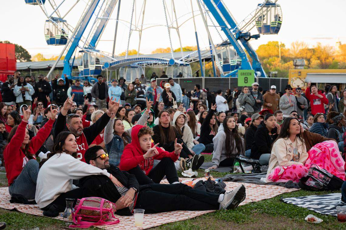 N.C. State fans gather to watch the NCAA Tournamet Final Four game at Dreamville Music Festival in Dix Park in Raleigh, NC on Saturday, April 6, 2024.