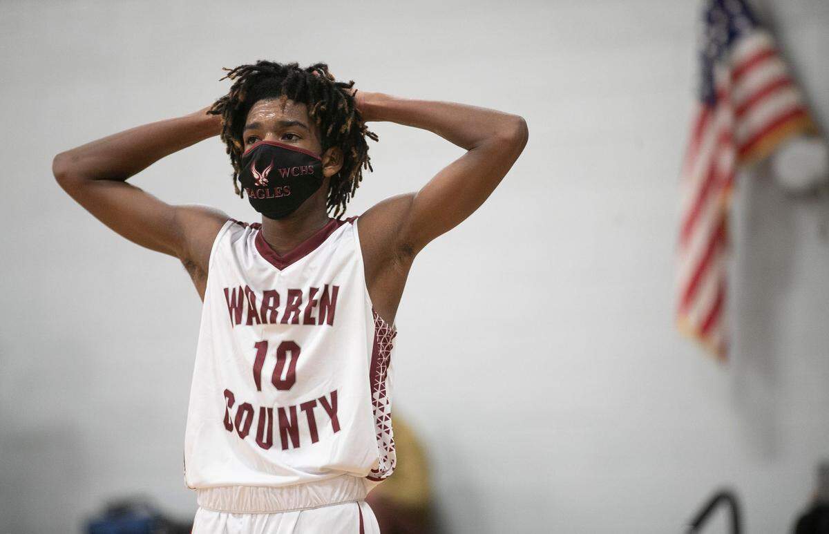 Warren County’s T.J. Williams (10) displays fatigue and frustration as the Eagles fall behind by double digits to Webb High School on Friday, January 29, 2021 in Warrenton, N.C.