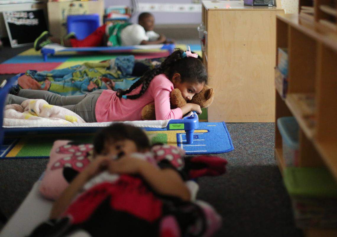 Pre-kindergarteners rest during nap time on Friday, March 28, 2014 at Hilburn Academy in Raleigh, N.C.