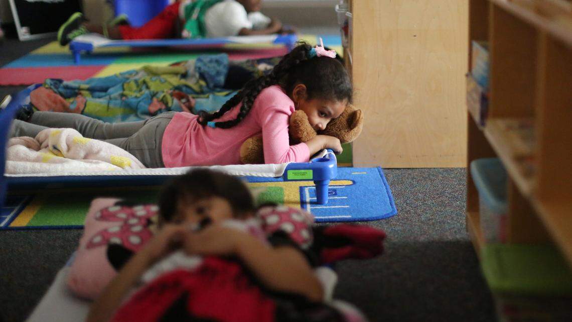 Pre-kindergarteners rest during nap time on Friday, March 28, 2014 at Hilburn Academy in Raleigh, N.C.