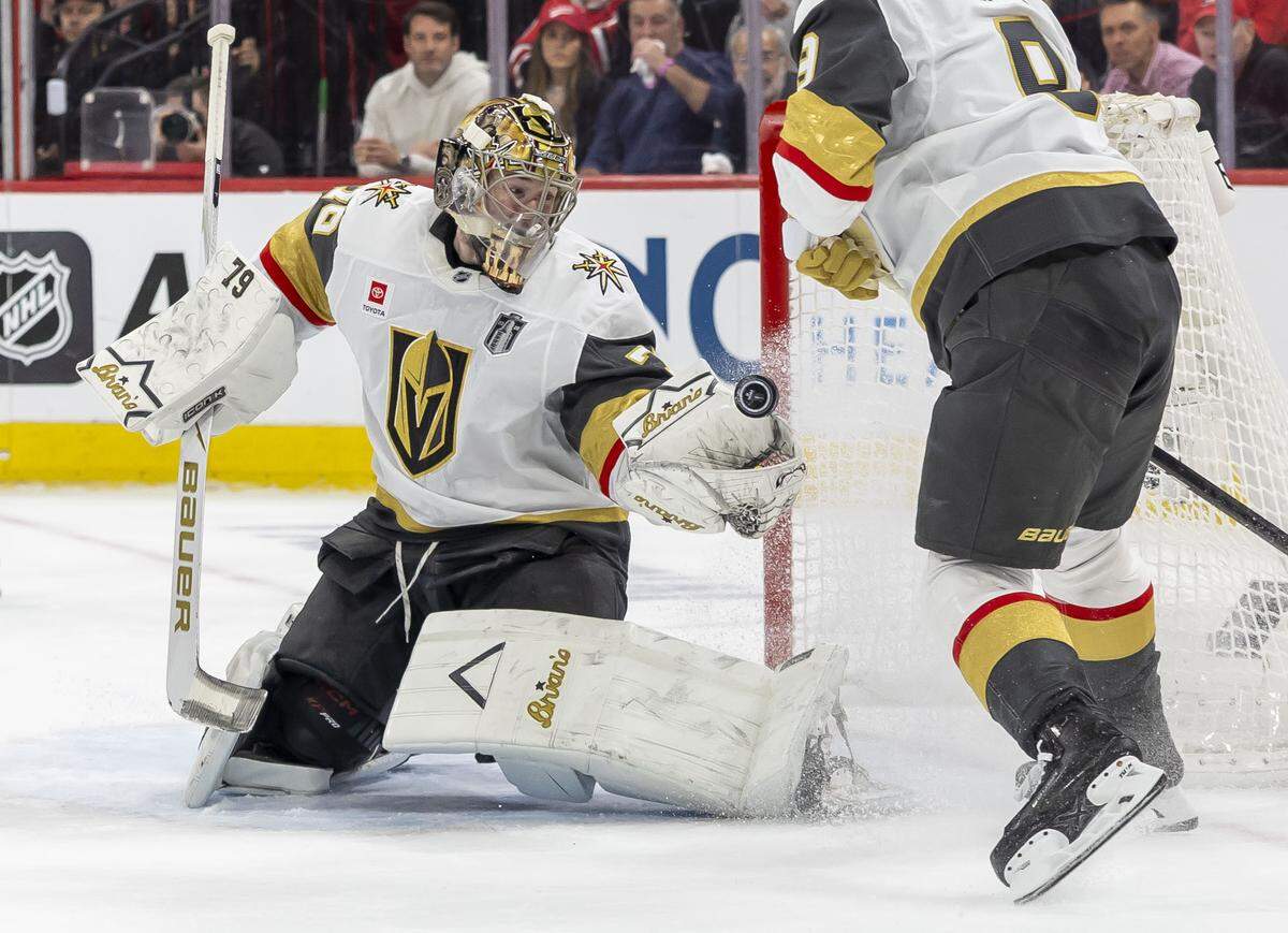 Las Vegas goalie Carter Hart (79)  makes a glove save on a scoring attempt by Carolina Hurricanes right wing Seth Jarvis (24) in the third period during Game 1 of the Stanley Cup Finals, on Tuesday, June 2, 2026 at Lenovo Center in Raleigh, N.C.