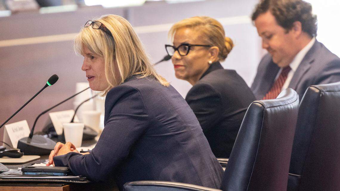 From left, SBI’s General Counsel Angel Gray, Gov. Roy Cooper’s Chief of Staff Kristi Jones, center, and General Counsel Eric Fletcher, testify before the House Oversight and Reform Committee to respond to accusations of meddling in the SBI by its Director Bob Schurmeier Tuesday, May 2, 2023 at the State Legislative Building.