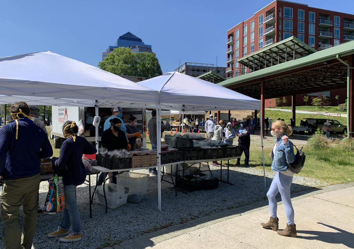The scene at the Durham Farmer’s Market Saturday morning, May 11, 2020.