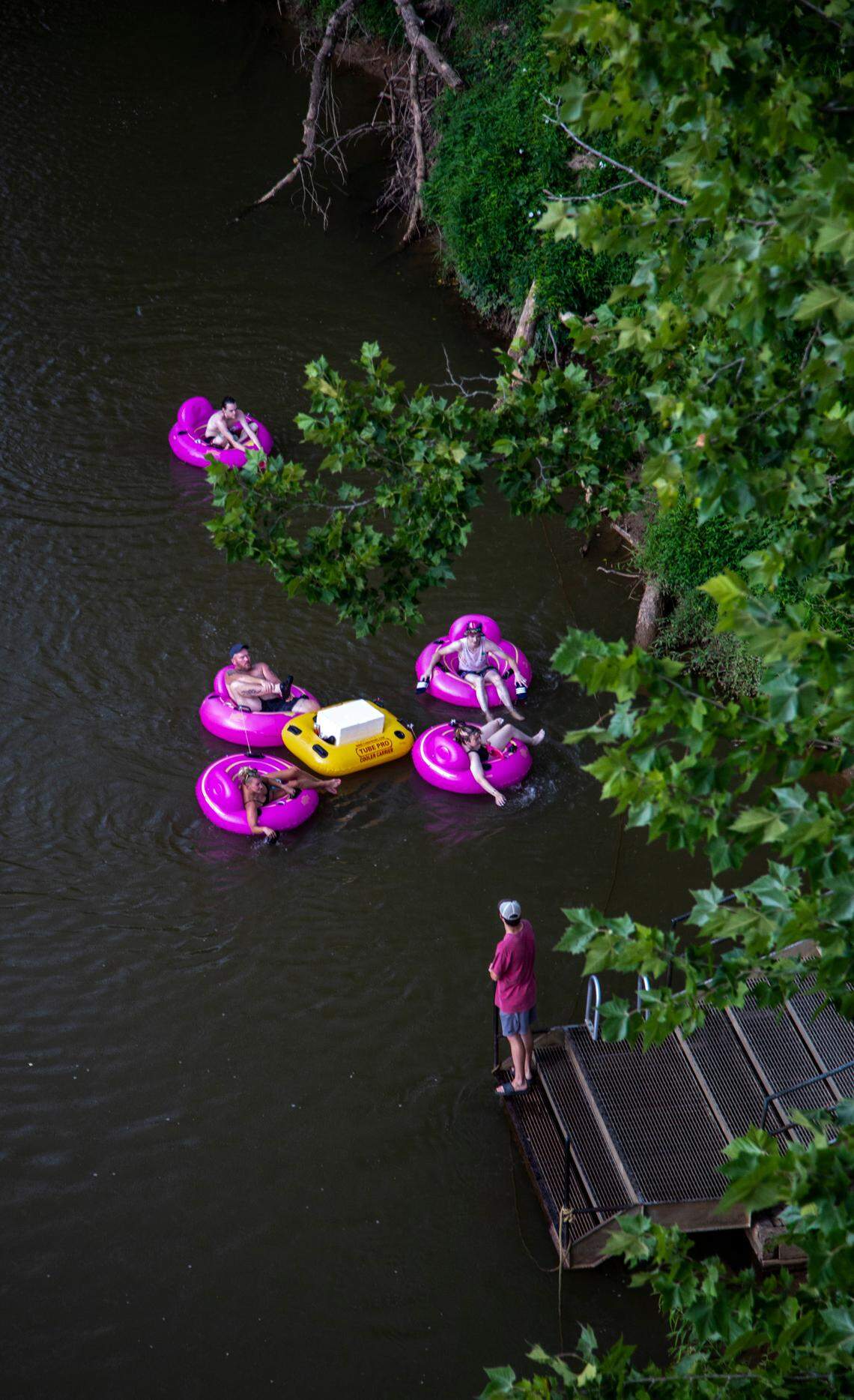 Visitors finish a tour of the Dan River.