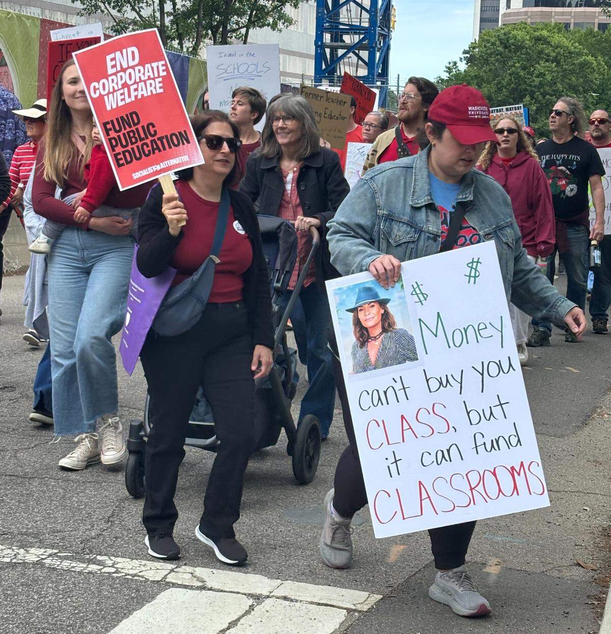 Teachers and supporters march through downtown Raleigh, May 1, 2026.