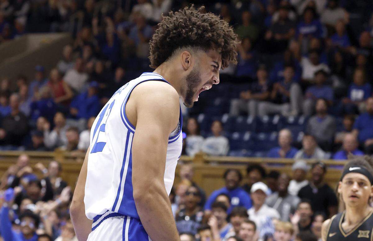 Duke’s Cameron Boozer (12) celebrates after making the basket after being fouled during the first half of Duke’s exhibition game against UCF at Cameron Indoor Stadium in Durham, N.C., Tuesday, Oct. 21, 2025.