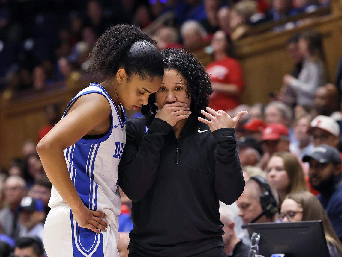 Duke head coach Kara Lawson speaks with Riley Nelson during the second half of the Blue Devils’ 83-65 win over N.C. State on Thursday, Feb. 19, 2026, at Cameron Indoor Stadium in Durham, N.C.