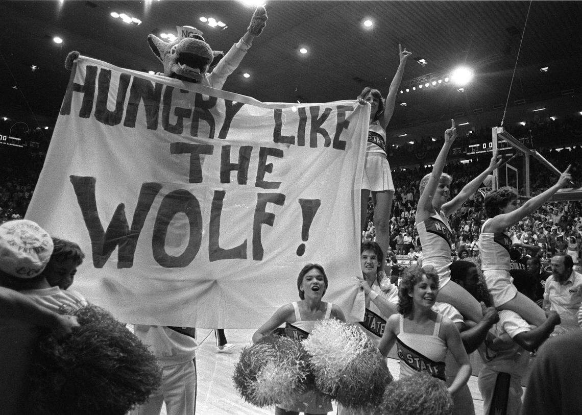 N.C. State cheerleaders pump up the semi-final crowd. The Wolfpack won the game 67-60.