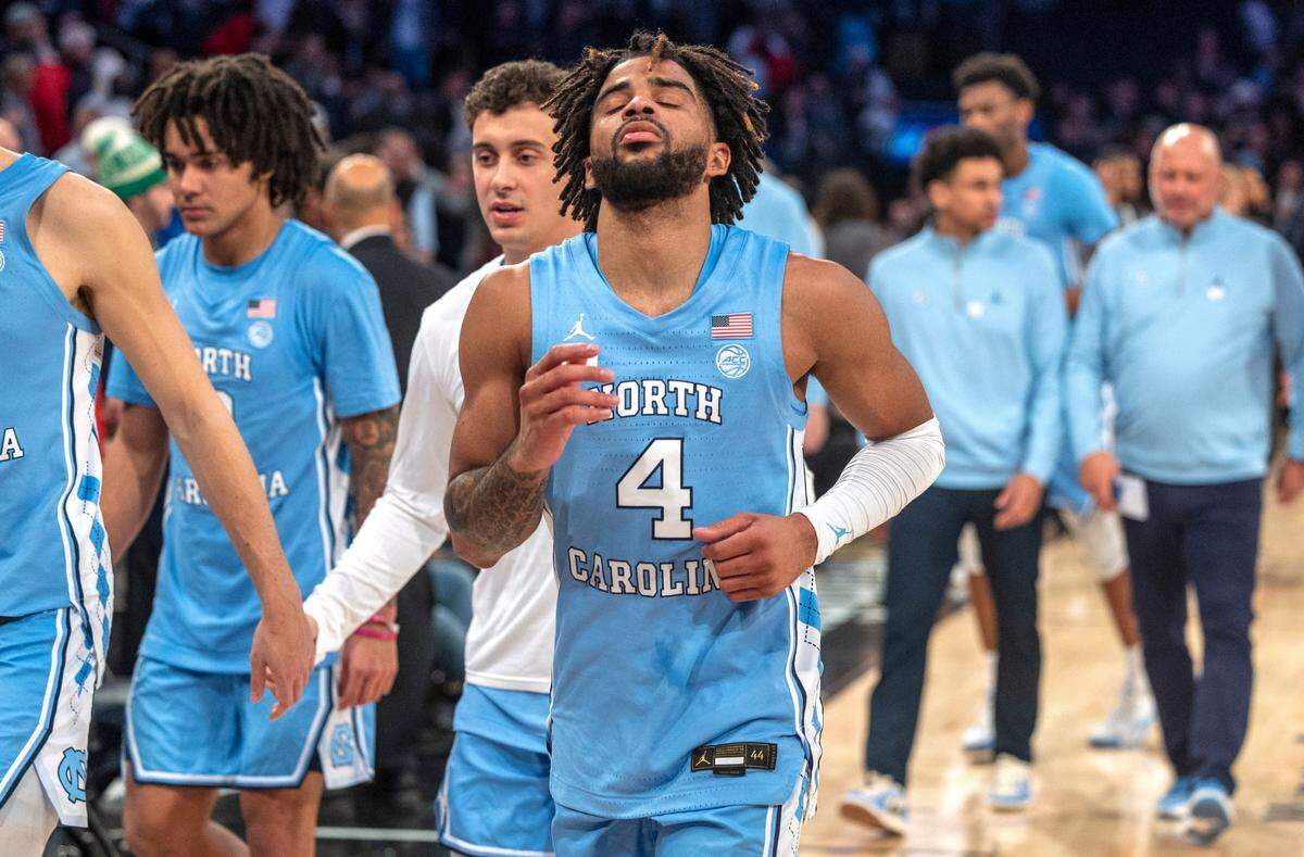 North Carolina’s R.J. Davis (4) leaves the court following the Tar Heels’ 87-76 loss to Connecticut in the Jimmy V Classic on Tuesday, December 5, 2023 at Madison Square Garden in New York, NY. Davis lead all scores with 26 points.