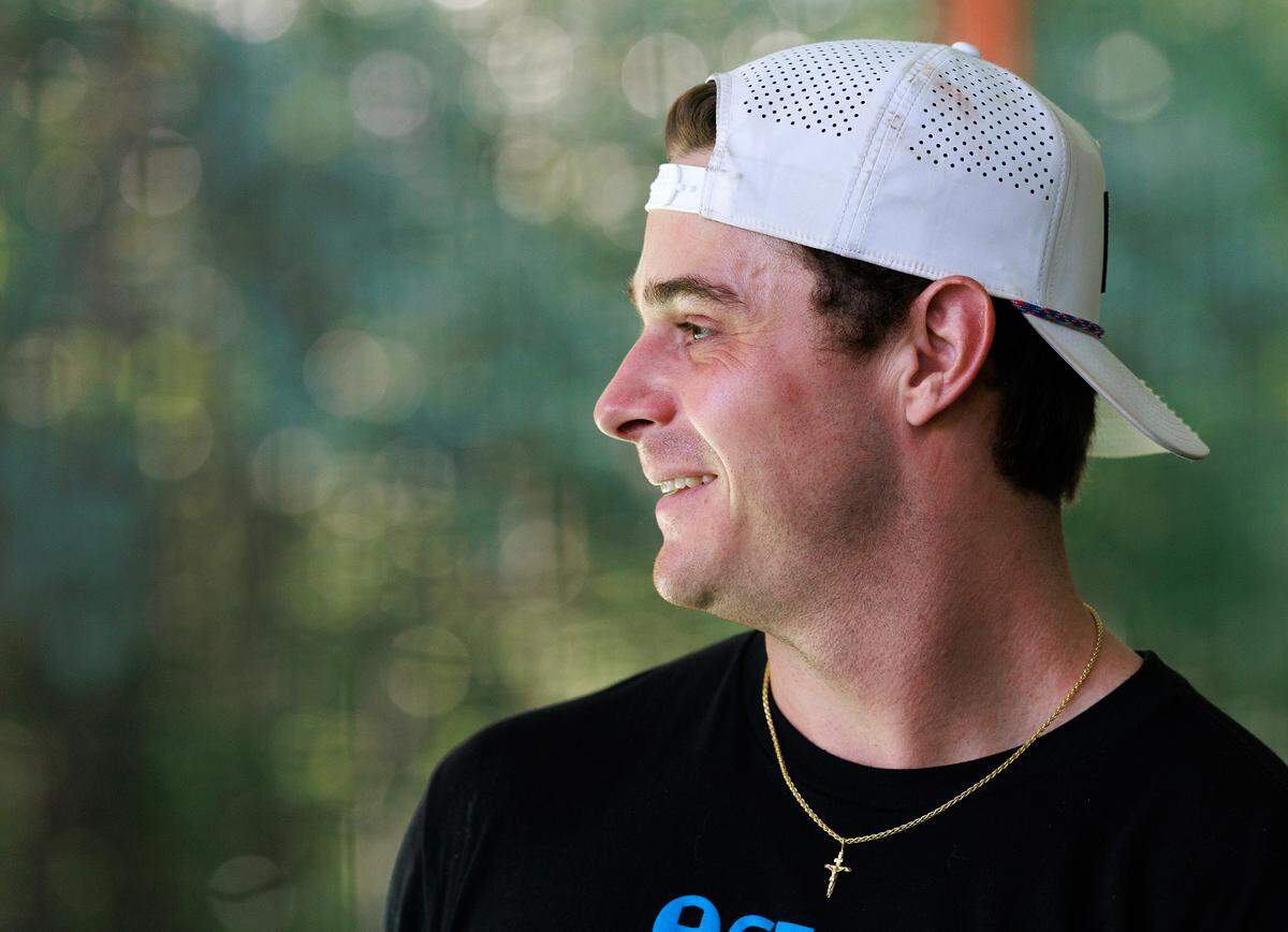 Matt Solter, Director of Performance at 8ctane Baseball, smiles while working with athletes on Thursday, June 19, 2025, in Raleigh, N.C. 
