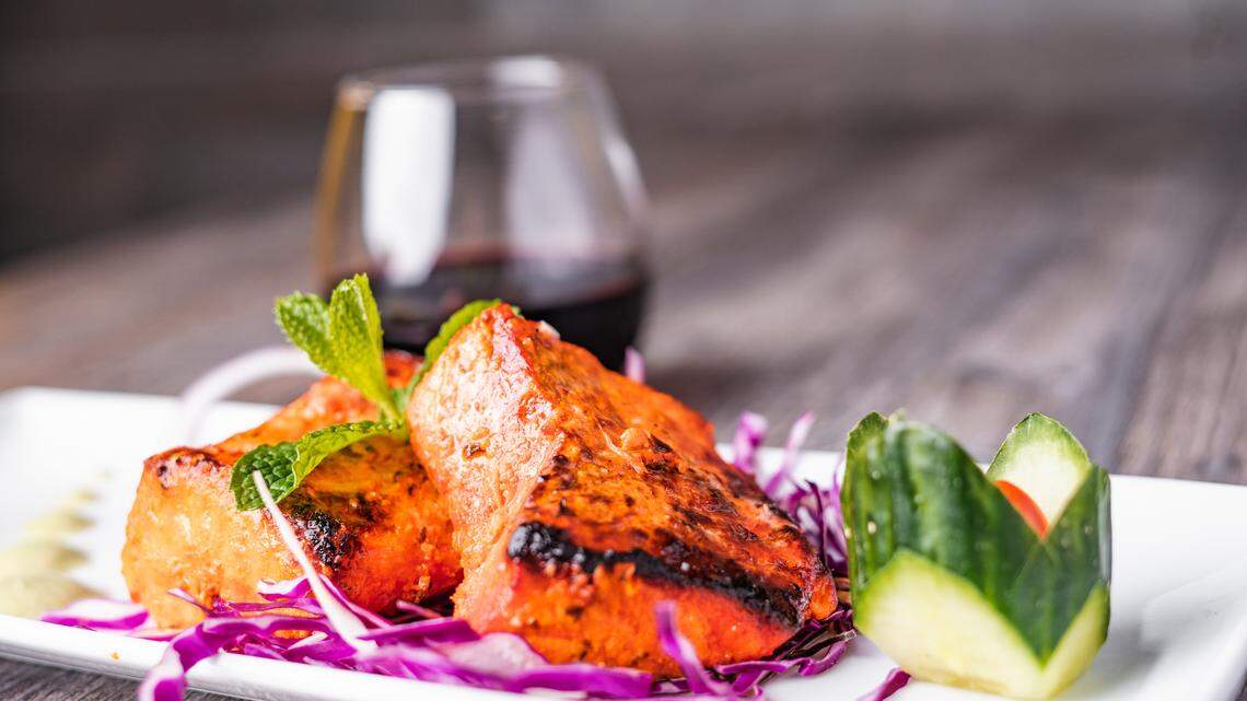 Tandoori salmon from Lime & Lemon includes spicy marinated salmon cooked in a tandoor.