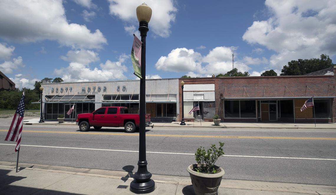 The business district of Fair Bluff, NC has been abandoned after the Lumber River flooded the businesses during Hurricanes Matthew in 2016 and Hurricane Florence in 2018 leaving several feet water in the buildings and rendering most unusable.