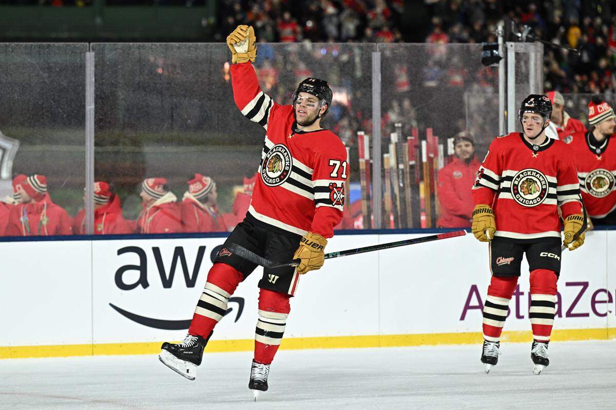 Chicago Blackhawks left wing Taylor Hall (71) celebrates after scoring a goal against the St. Louis Blues during the first period in the Winter Classic at Wrigley Field.