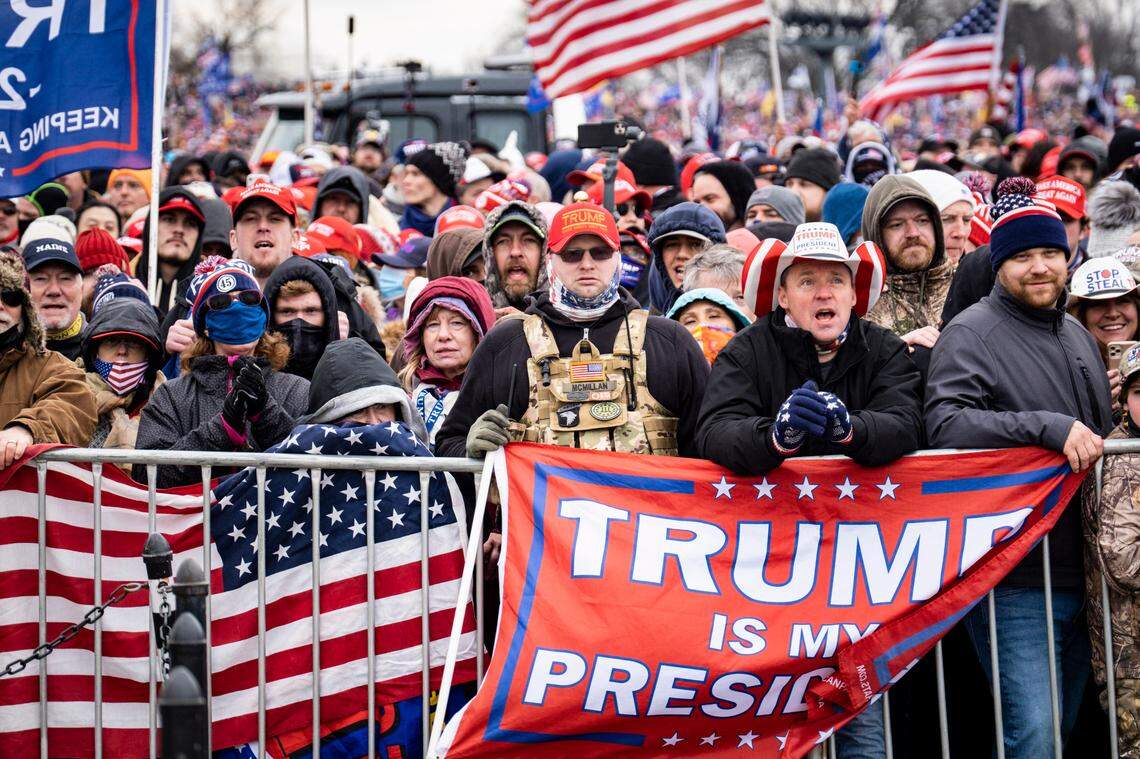 People gather at a rally in Washington on Wednesday, Jan. 6, 2021, to protest the presidential election results. President Donald Trump addressed the rally.
