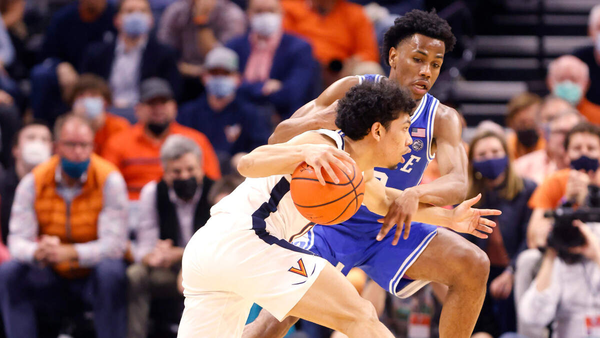 Duke’s Jeremy Roach (3) defends Virginia’s Kihei Clark (0) during the second half of Duke’s 65-61 victory over Virginia at John Paul Jones Arena in Charlottesville, VA, Wednesday, Feb. 23, 2022.