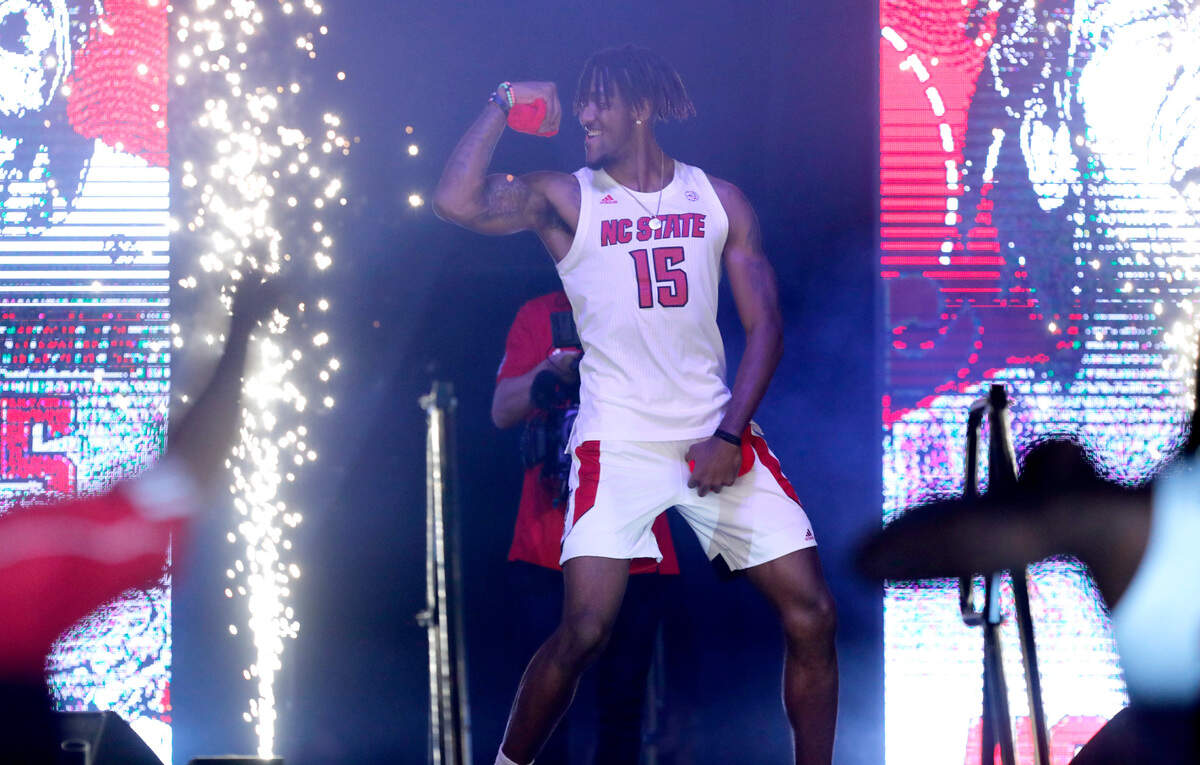 N.C. State’s Manny Bates (15) is introduced during Primetime with the Pack at Reynolds Coliseum in Raleigh, N.C., Thursday, October 14, 2021.