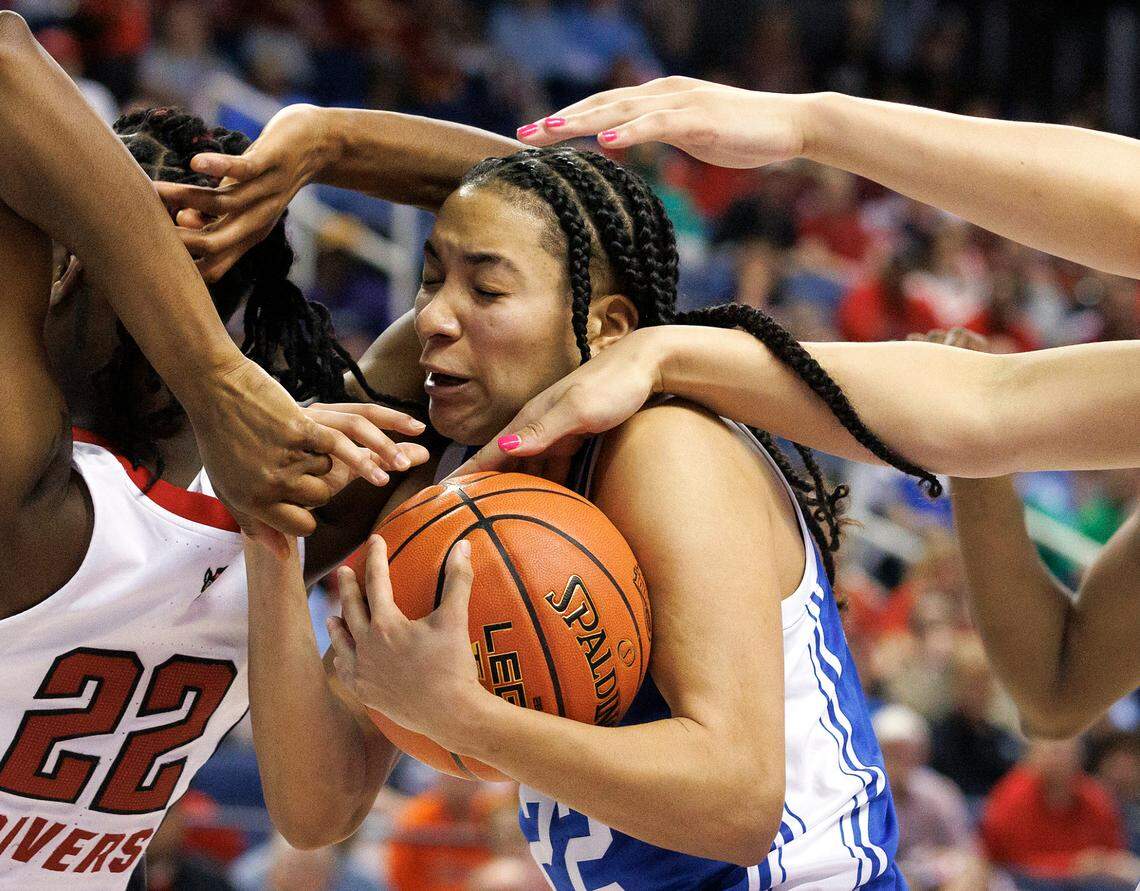 Duke’s Taina Mair pulls down a rebound away from N.C. State’s Saniya Rivers and Mimi Collins during the second half of the Blue Devils’ 54-51 loss in the ACC Tournament quarterfinals on Friday, March 8, 2024, at Greensboro Coliseum in Greensboro, N.C.