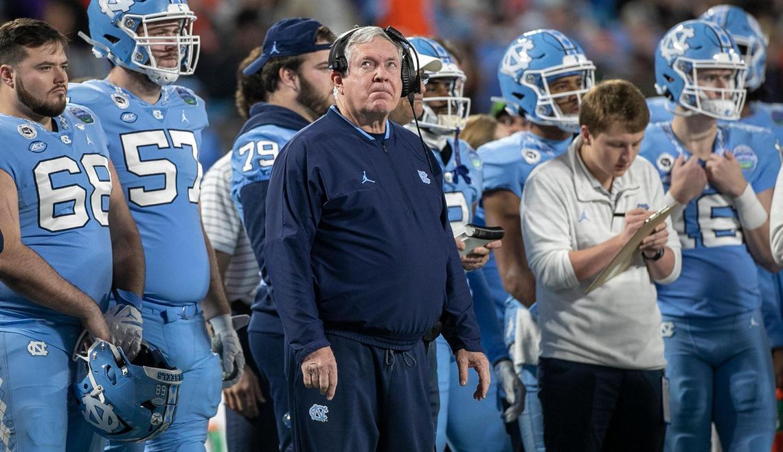 North Carolina coach Mack Brown glances at the scoreboard after Clemson’s Will Shipley scored to give the Tigers’ a 39-10 lead in the third quarter in the ACC Championship game on Saturday, December 3, 2022 at Bank of American Stadium in Charlotte, N.C.