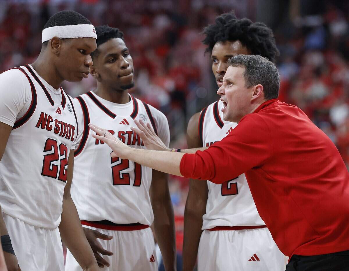 N.C. State head coach Will Wade talks with his team late in the second half of the Wolfpack’s 82-58 win over North Carolina on Tuesday, Feb. 17, 2026, at Lenovo Center in Raleigh, N.C.