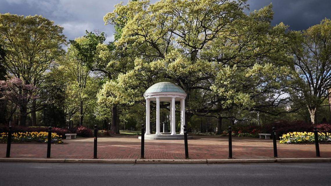 The Old Well on UNC-Chapel Hill’s campus is without its usual spring-time visitors on the evening of April 1, 2020. University campuses across North Carolina closed in March to prevent the spread of COVID-19.