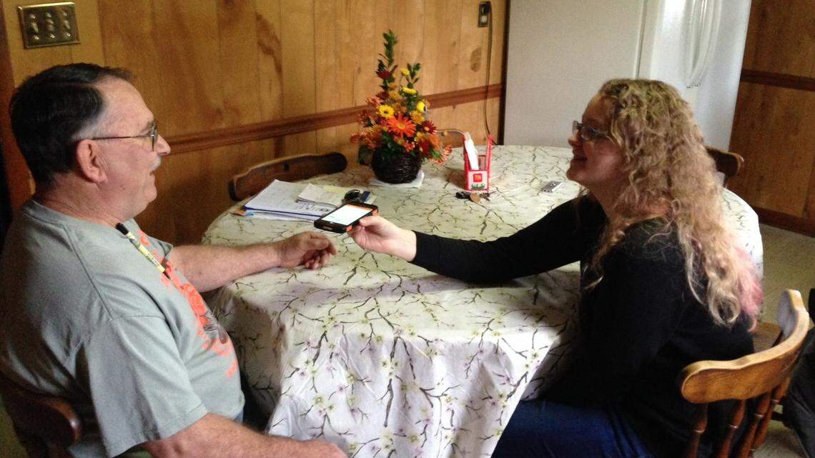 In this Nov. 27, 2015, file photo, Rhiannon Leonard interviews her boss, Gary Himes in Weverton, Md., for StoryCorps’ Great Thanksgiving Listen oral history project.